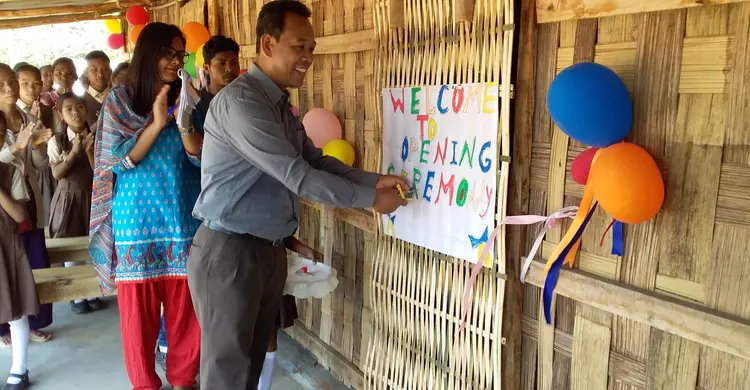 Pastor Markbirth cutting the ribbon of Mount Penuel School Kimbokgre