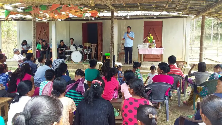 Mr. Sunmith G. Momin delivering the message at Rongmasu Mission Field
